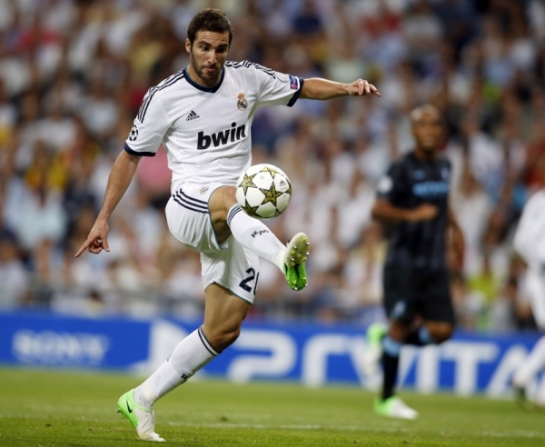 Real Madrid's Higuain controls the ball during their Champions League soccer match against Manchester City in Madrid