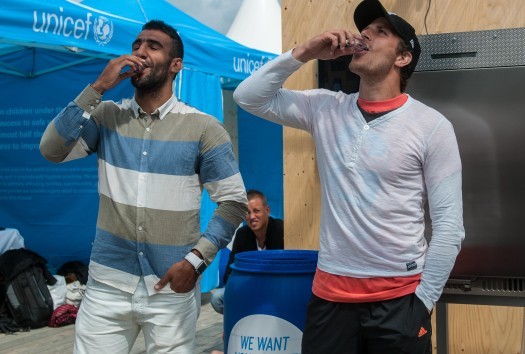 Footballer-Mohammed-Ali-Khan-And-Tobias-Hysén-Drinking-Sample-Water-From-Sweat
