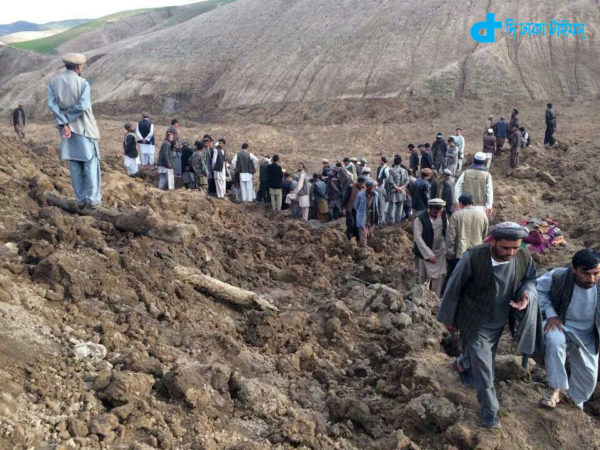 Afghans search for survivors after a massive landslide landslide buried a village Friday, May 2, 2014 in Badakhshan province, northeastern Afghanistan, which Afghan and U.N. officials say left hundreds of dead and missing missing.(AP Photo/Ahmad Zubair)