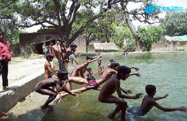 children in the village pond