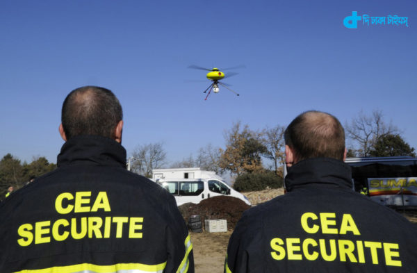 French members of Commissariat a l'Energie Nucleaire, CEA (Atomic Energy Centre) look at a drone during a simulation exercice combining a nuclear accident and an earthquake at the Cadarache CEA nuclear plant, on January 17, 2012, in Saint-Paul-les-Durance, southeastern France.   AFP PHOTO / BORIS HORVAT (Photo credit should read BORIS HORVAT/AFP/Getty Images)