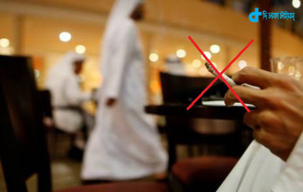 ABU DHABI, UNITED ARAB EMIRATES - January 12, 2009: A man smokes a cigarette at a cafe in Marina Mall, Abu Dhabi. The United Arab Emirates government is in the process of implementing a smoking ban. ( Ryan Carter / The National )