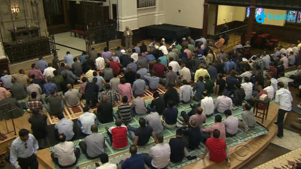 Muslims pray in a church story